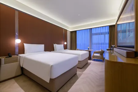 Crystal Orange Hotel Haimen Wenfeng Great World Отели рядом со станцией Haimen Railway Station