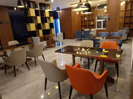 Yishang Hotel (Tianjin Binhai New District Dagang Wanda Plaza Branch) Отели рядом с достопримечательностью «Tianjin Prosecutors College»
