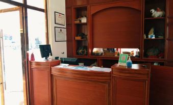 Suoge Yongxin Business Hotel