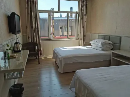 Huayi Store Hotel Отели рядом с достопримечательностью «Сунхуа оригинальный лесной парк»