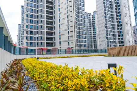 HOLAND GARDEN HOTEL Отели рядом с достопримечательностью «Qijiang Normal College (Qishan Campus)»