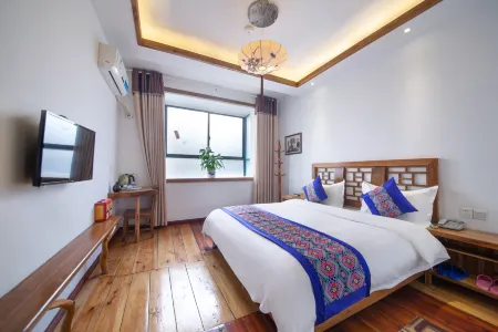 Hetianwan Inn Отели рядом с достопримечательностью «Jishou University Zhangjiajie Campus»