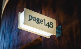 "A sign with an interesting design in the middle that says ""I love you" at Page148, Page Hotels