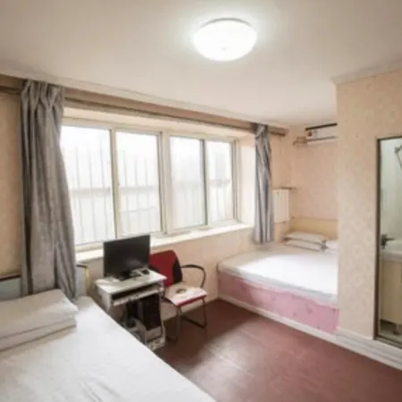 Baicheng Aige Fashion Hotel