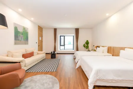 Pengzhou Wusuoshishi Homestay Отели рядом с достопримечательностью «Bailu Limestone Cave Wonder Peak»