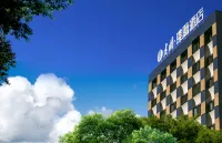 Jianguo HIDDEN Hotel (Pu'er Tea Source Plaza Daijia Alley)