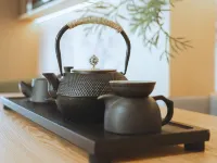 QIANNA HOTEL GLORIOUS (Xinyang Railway Station Shihe District)