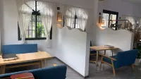 Huangguoshu Shiming Ruihe Chinese Inn - vue sur la montagne