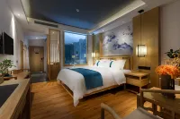 Puer Jiusi Suyuan Hotel