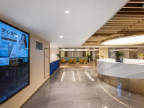 Orange Hotel (Qidong Wenfeng Dashijie) Hotels in Qidong