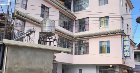 Shidian Hongyuan Hotel Отели рядом с достопримечательностью «Qingniu Baima Square»