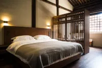 Xigu Huiyuan Guesthouse Hotels near Matiliang