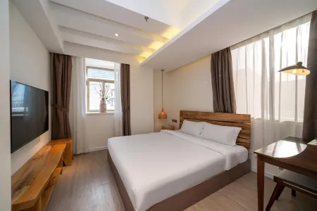 Floral Hotel · Peninsula Riverview hotel (Chaozhou ancient city archway store) Отели рядом с достопримечательностью «Danfu Courtyard»