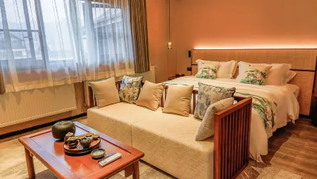 Hexuan Yashe  Chongqing Отели рядом с достопримечательностью «Dazu Stone Carving Baoding Mountain Scenic Area - Guiding Service Hall»