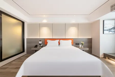 Junzi Orchid Hotel (Hainan Business College Provincial Government Store) Отели рядом с достопримечательностью «Hainan Institute of Science & Technology»