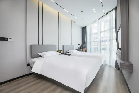 Qingmu Inns (Nanjing Danfeng Street Hengji Apartment) Отели рядом с достопримечательностью «Nanjing University Gulou Campus Suzhe Playground»