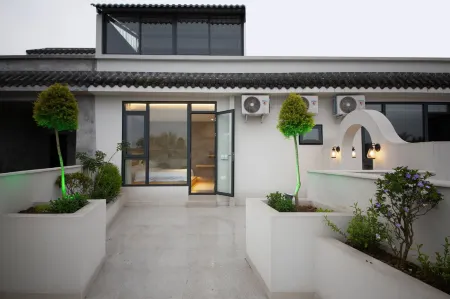 Guinong Courtyard Yuji Homestay Отели рядом с достопримечательностью «Pingle Ancient Town»