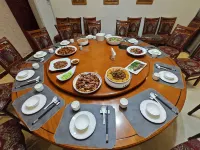 Ludian No Goodnight Pavilion Homestay - servizio colazione