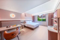 Orange Hotel（Xishuangbanna Water-Splashing Square） Hotel a Poshui Plaza