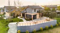 Muyun Country Homestay Hotel dekat Guqiao Street
