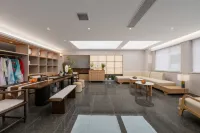 Qian Na Mei Su Hotel (Xiangcheng Wanda Plaza Oubaisa Mall Branch)