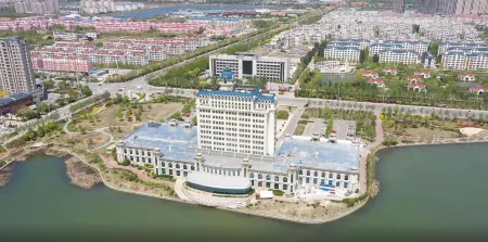 Blue Horizon Junhua Hotel (Binzhou Bailu Lake) Отели рядом с достопримечательностью «Binzhou Polytechnic»