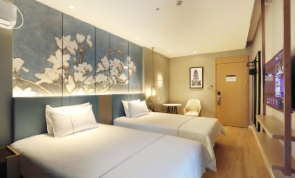 White Yulan Hotel (Xi'an Hangtiancheng Metro Station) - Housity