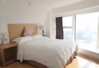 Nantong CBD Zhongnan Rainbow Yiloft Apartment - Mountain view