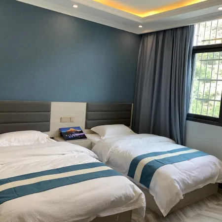 Muli Xinsheng Business Hotel