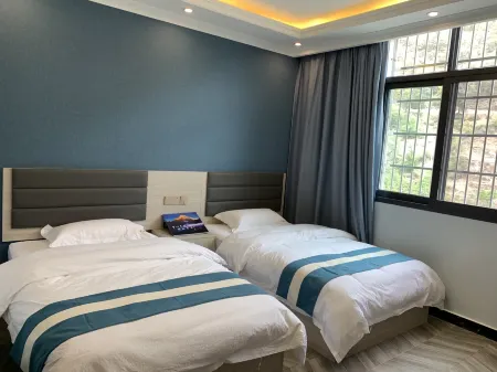 Muli Xinsheng Business Hotel