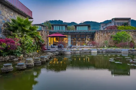 Yuanyang  Nuoma Amei Tea  Manor Отели рядом с достопримечательностью «Pu Gao Lao Zhai»