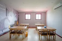 Pebble Hotel (Qingxu Xugou) - فطور