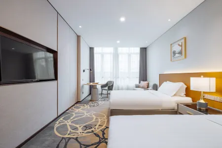 Cypress Garden Hotel Отели рядом с достопримечательностью «Shanghai University of Engineering Science Gymnasium»