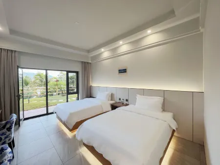 Jinghong No. 1 Mansion Отели рядом с достопримечательностью «Menghanman Tingfota Temple»