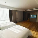 Vienna Hotel （Xinhe Yixing Building Hotel） Hotels in Xinhe