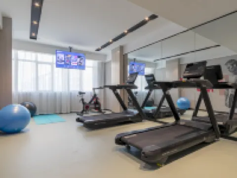 Echarm Hotel (Huangshi Daye Gaotiebeizhan Jinjiuchang) Hoteles en Daye