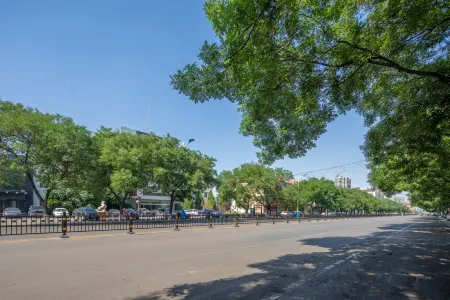 Dong Xing Grand Hotel Отели в г. Сяои