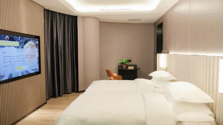 Qingdao Conson Sports Center Hotel Отели рядом с достопримечательностью «Ocean University of China Laoshan Campus»