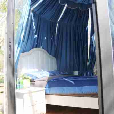 Huali Valley Hotel Rooms