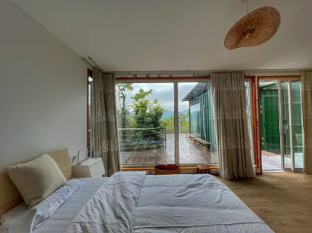 Floating Clouds Homestay Отели рядом с достопримечательностью «Taihuyuan Scenic Area»