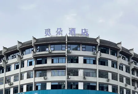 Mi Duo Hotel Отели рядом с достопримечательностью «Zhijiang Tianhou Temple»