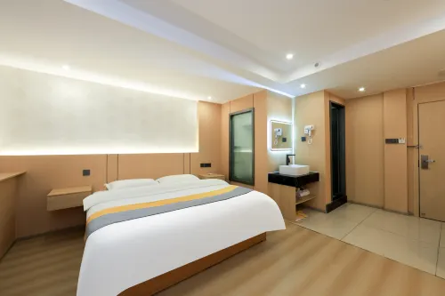 Wenxinge Hotel (Changchun Longjia airport high speed railway station store)