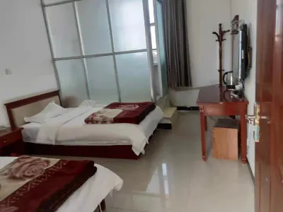 Purang Xinyue Hotel