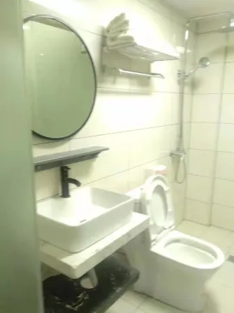 Guzhang Pingji Hotel Отели в г. Гучжан