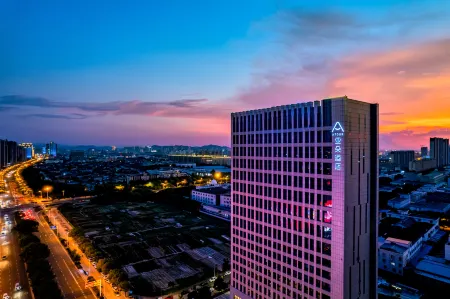 Atour Hotel Aegean in the center of Cixi City Отели рядом с достопримечательностью «College of Science and Technology, Ningbo University»