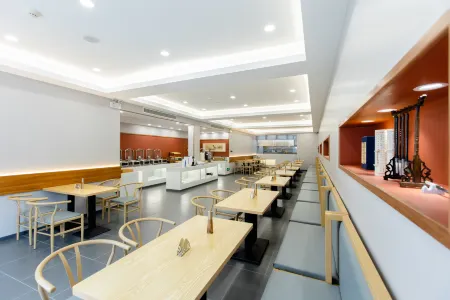 Qufu Queli Bi Lin Hotel Отели рядом с достопримечательностью «WuMaCi Jie»