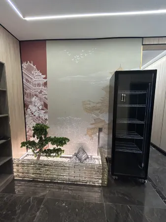 Junan County Qiangwei Homestay Отели в г. Цзюйнань