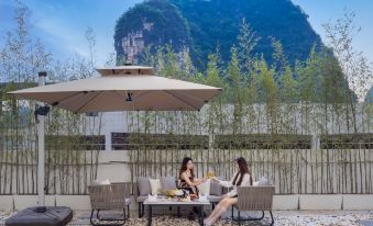 Moshang Landscape Printing Hotel (Guilin Yangshuo Yulong River Branch)