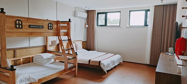 Weishan Island Guhuai Renjia Fish Restaurant Homestay Отели в г. Вейшань