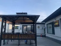Xiong Xiongzhouzhen Manwoniu Homestay